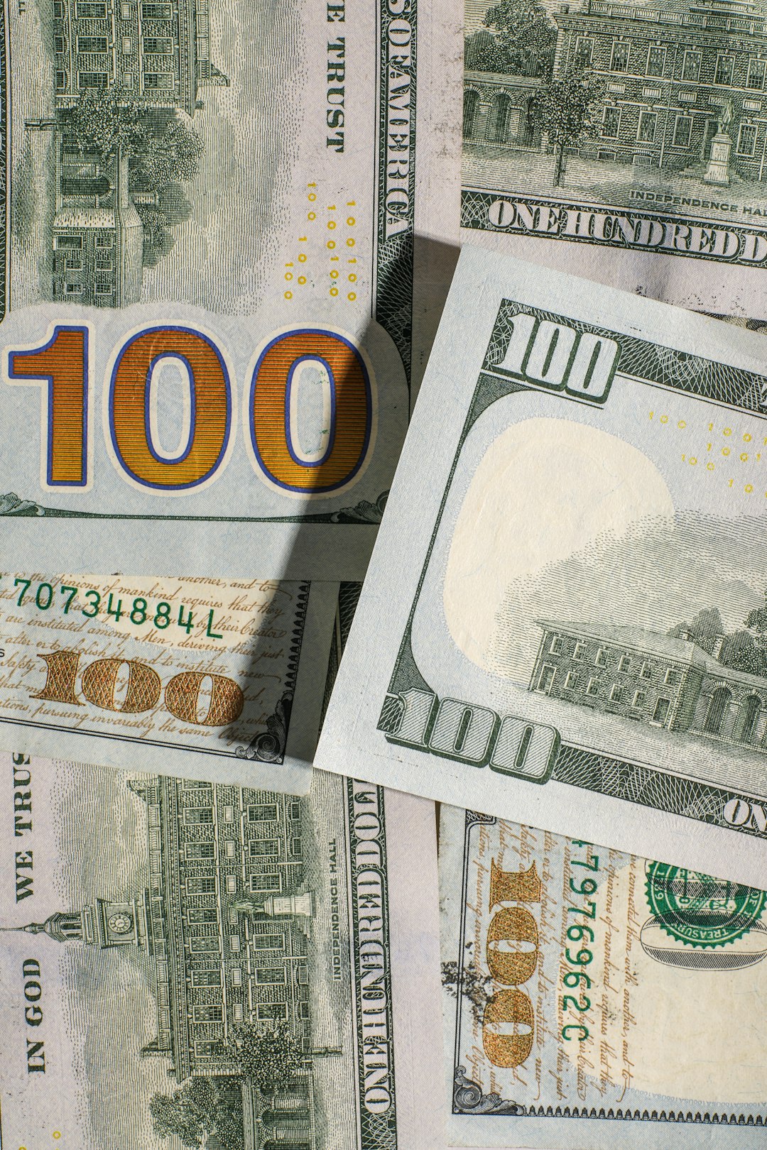 services-03 one-hundred-dollar-bills-spread-out-ld19p-tjlgk